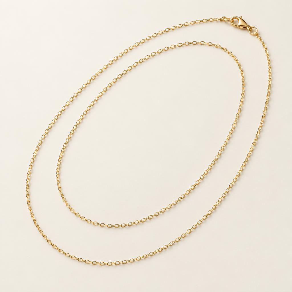 Illustrative delicate yellow gold cable chain